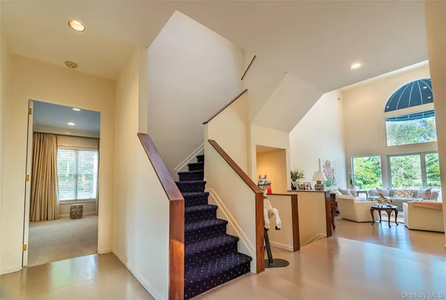 a view of a swimming pool with an outdoor space and seating area