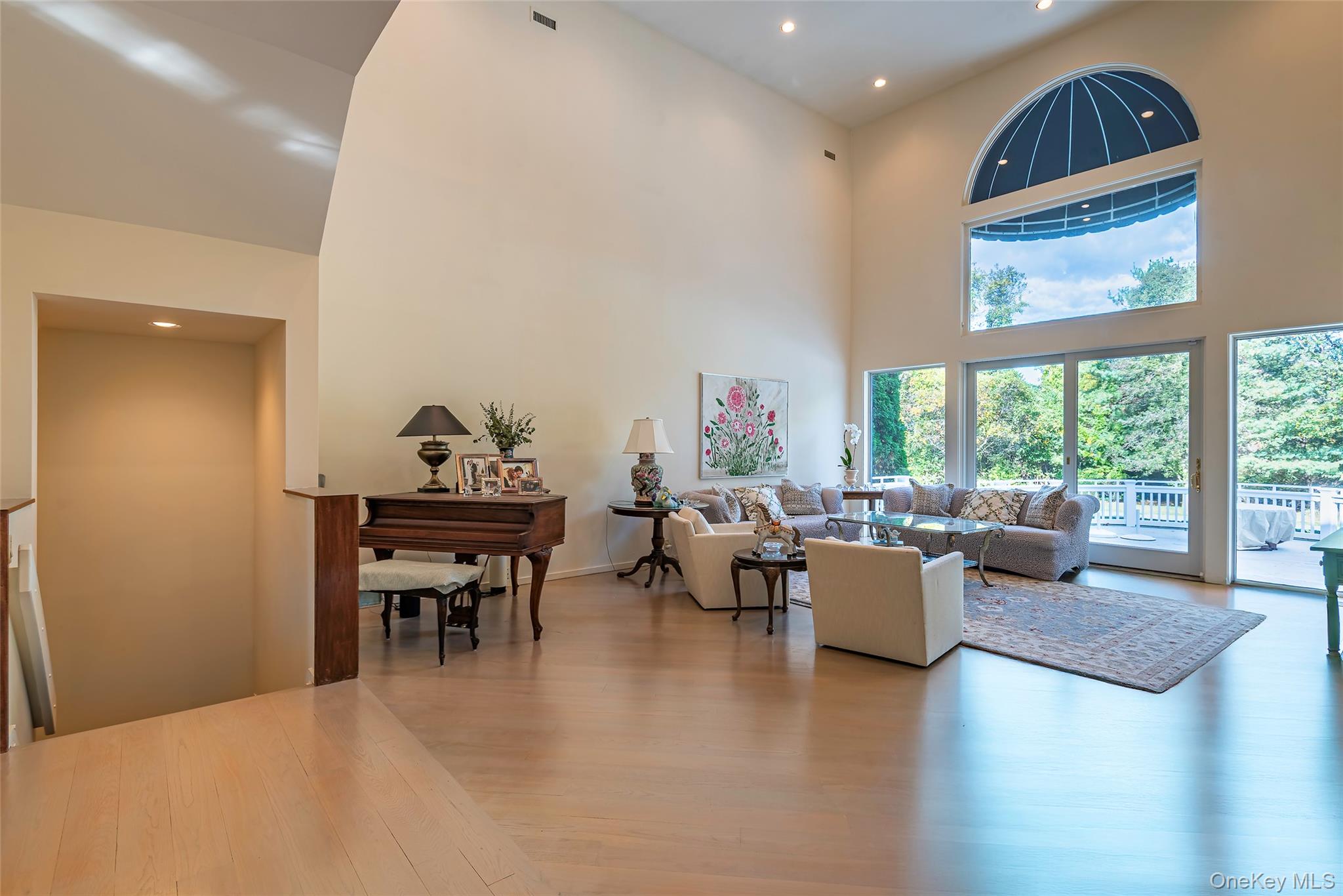 735 Remsens Lane Upper Brookville, NY 11771 - Photo 6 of 44 Community lobby with a towering ceiling and recessed lighting