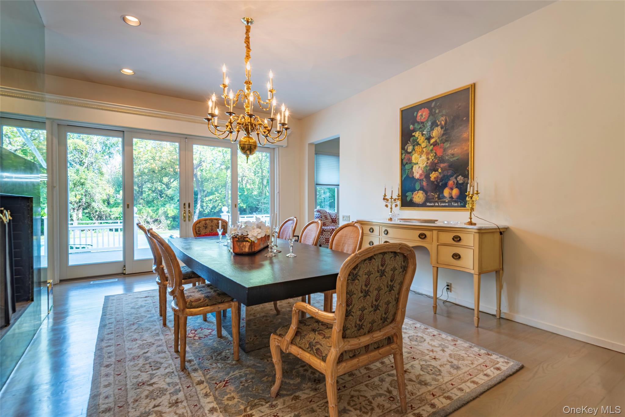 735 Remsens Lane Upper Brookville, NY 11771 - Photo 10 of 44 Dining space featuring a chandelier, recessed lighting, and wood finished floors
