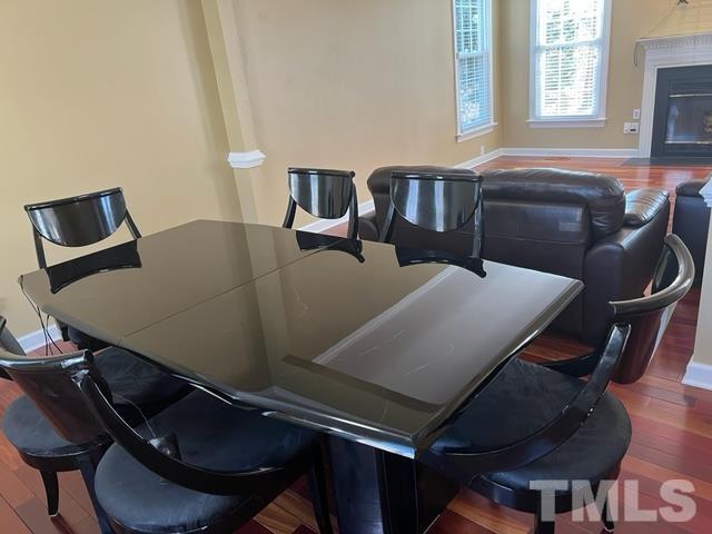 2420 Finley Ridge Lane Raleigh, NC 27615 - Photo 5 of 37 a view of a dining room with furniture and window