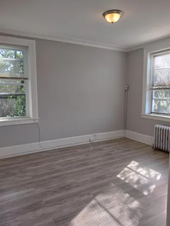 a view of an empty room and window