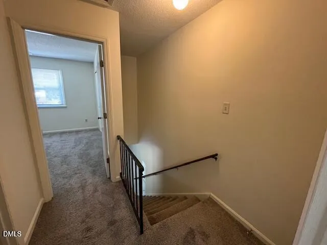 a view of hallway with stairs