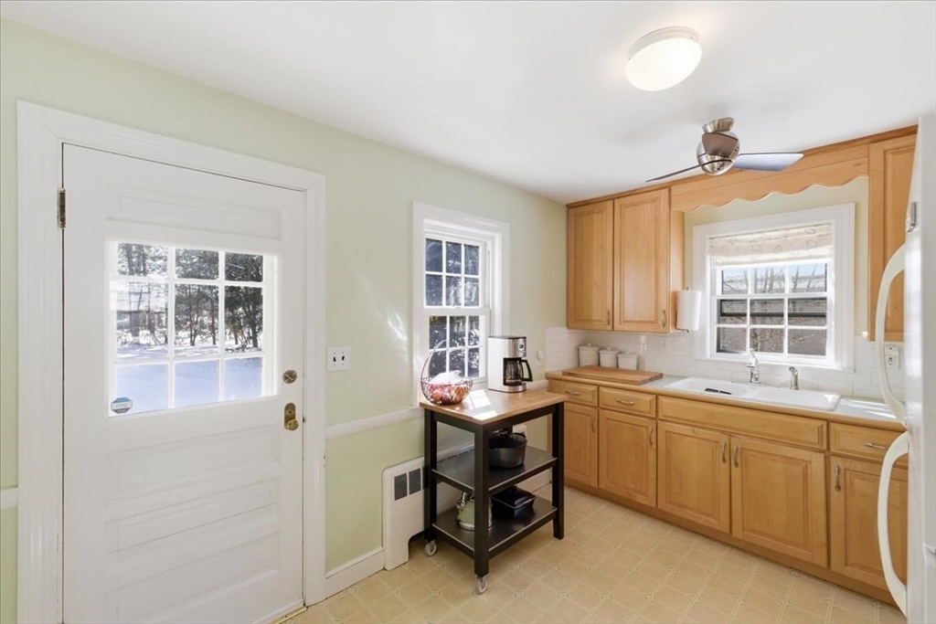 46 Park Street Dedham, MA 02026 - Photo 11 of 35 a room with a window closet and couch