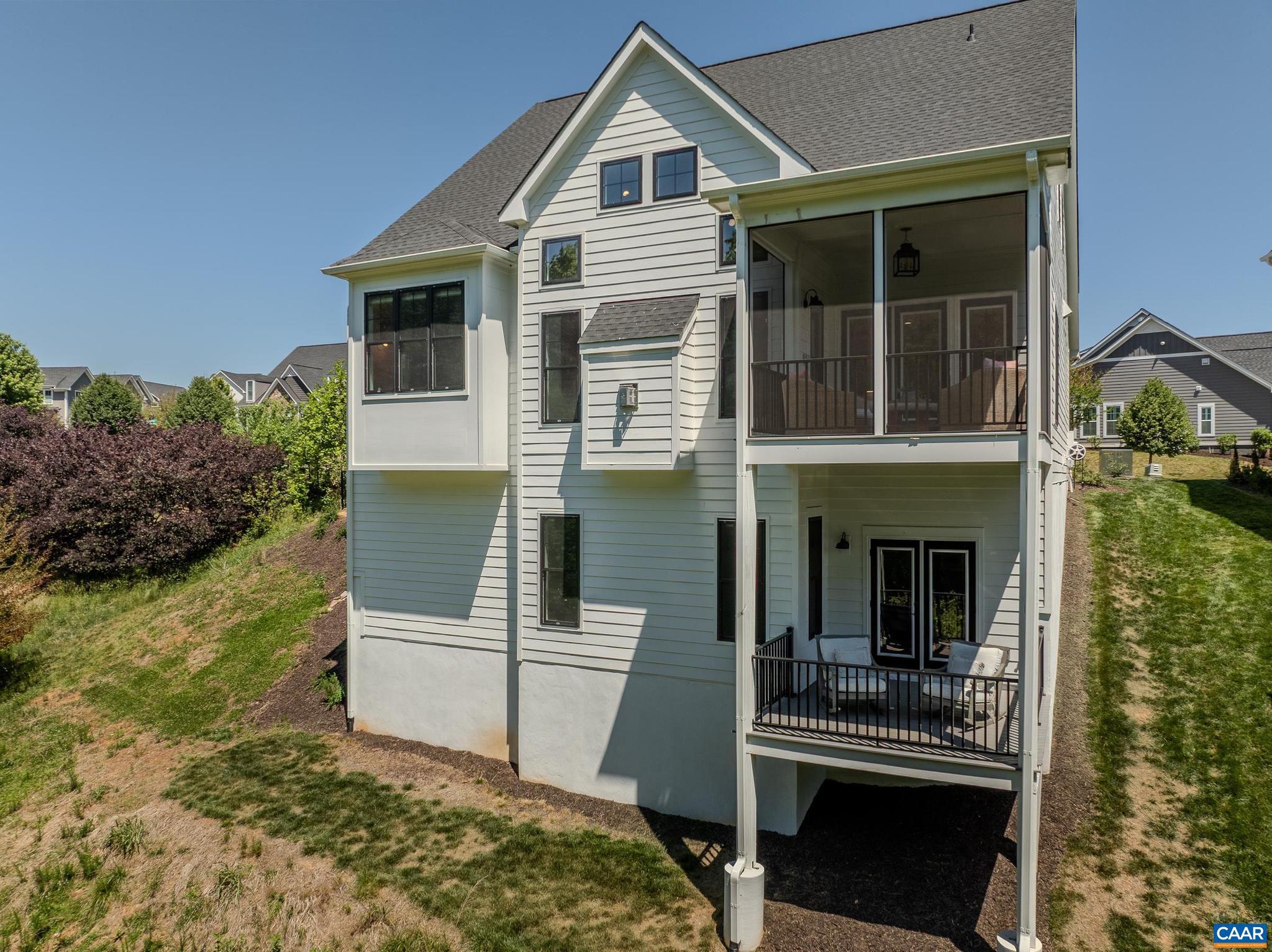 3327 Rowcross Street Crozet, VA 22932 - Photo 61 of 63 a front view of a house with a yard