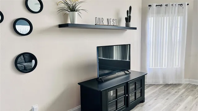 a view of a workspace with furniture