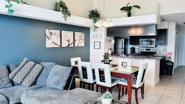 a view of kitchen dining table and chairs