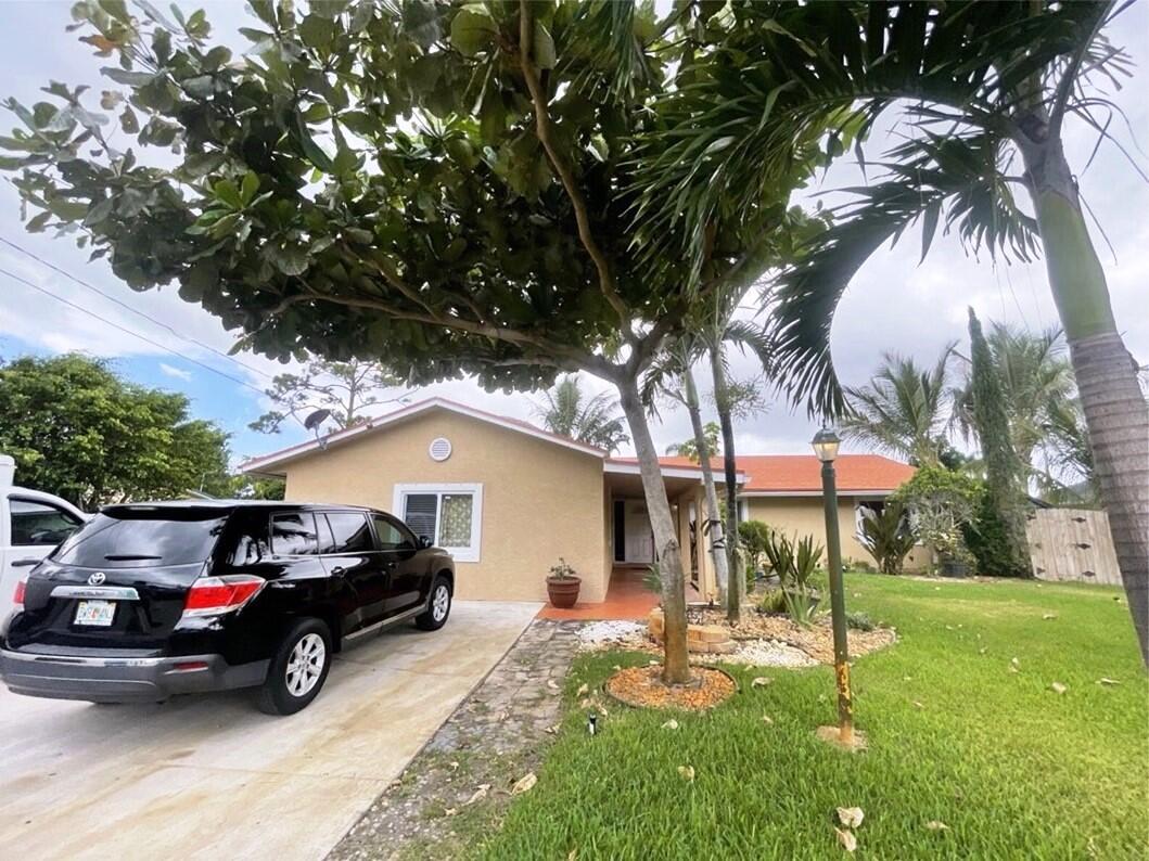4447 Melvin Road Lake Worth, FL 33461 - Photo 1 of 34 Front 4447 Melvin Rd