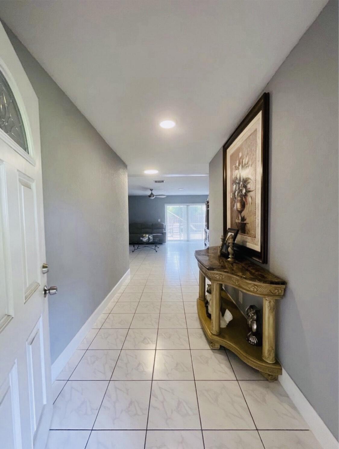 4447 Melvin Road Lake Worth, FL 33461 - Photo 6 of 34 Front Hallway