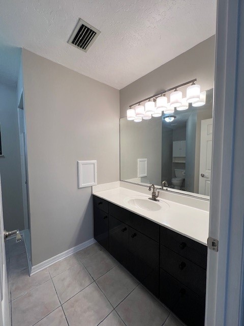 762 Bayfront Terrace Sebastian, FL 32958 - Photo 10 of 11 a bathroom with a double vanity sink and mirror