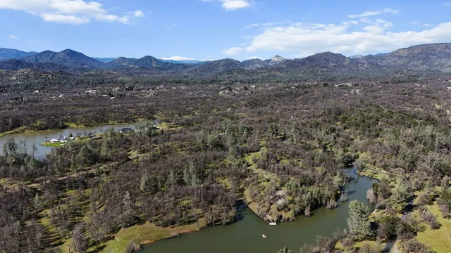 a view of a lake with mountains in the background