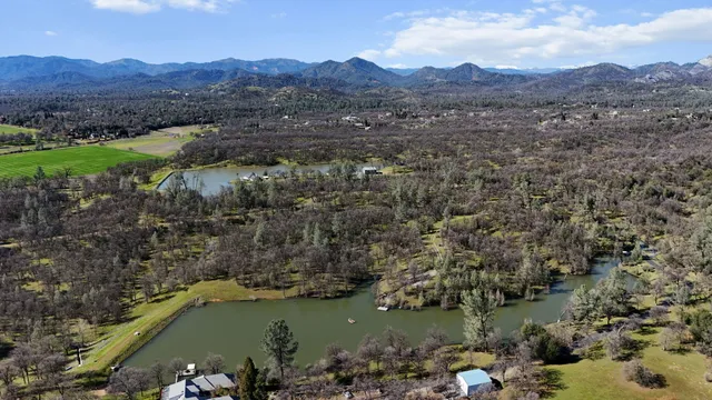 a view of a lake with mountains in the background