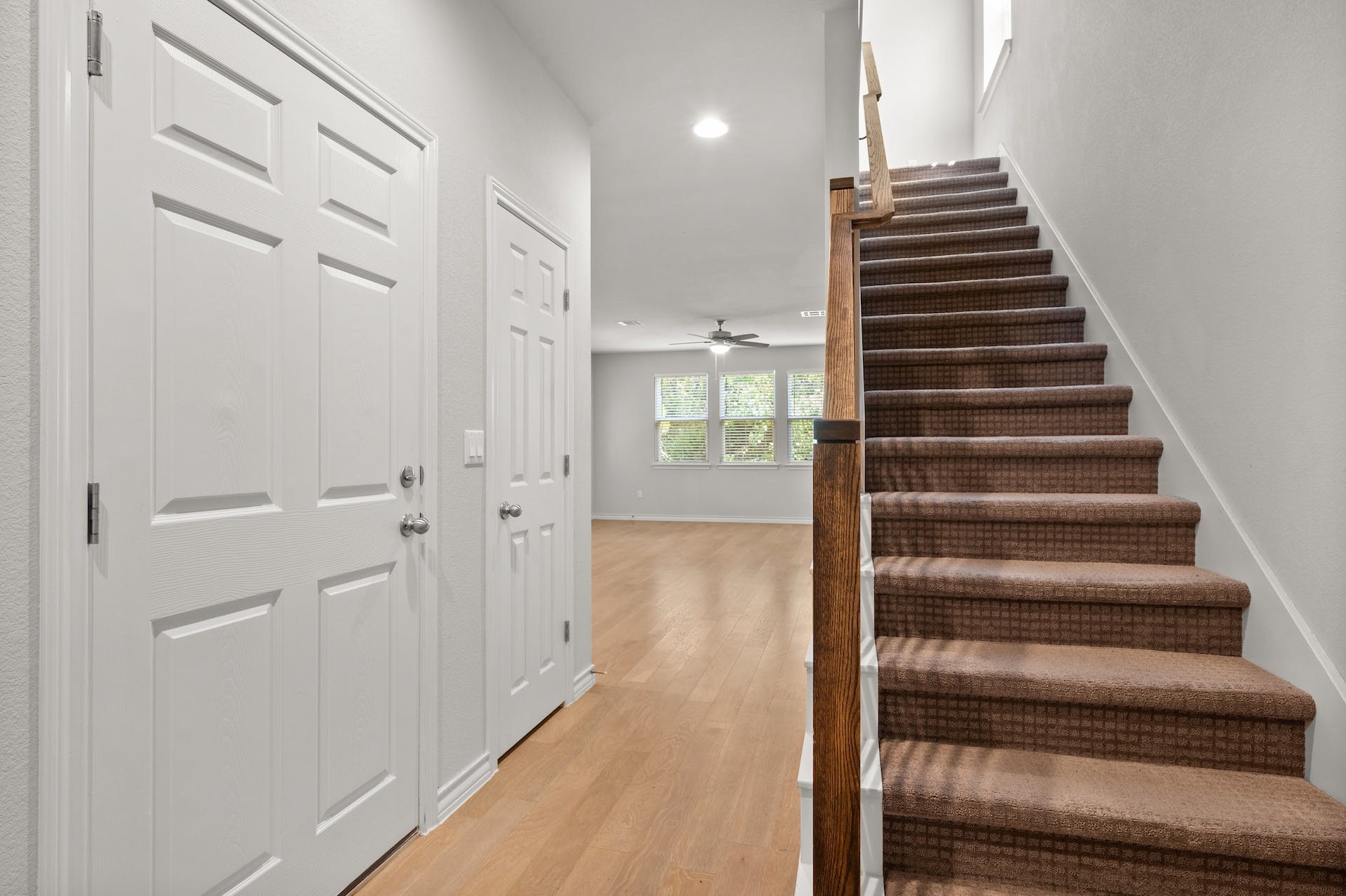 5107 Lemon Tree Path, Unit 127 Austin, TX 78723 - Photo 16 of 40 a view of a hallway with wooden floor and entryway