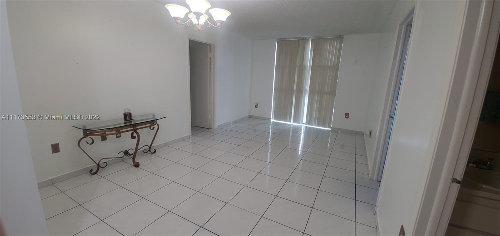 2075 Southwest 122nd Avenue, Unit 320 Miami, FL 33175 - Photo 12 of 38 a view of a room with windows
