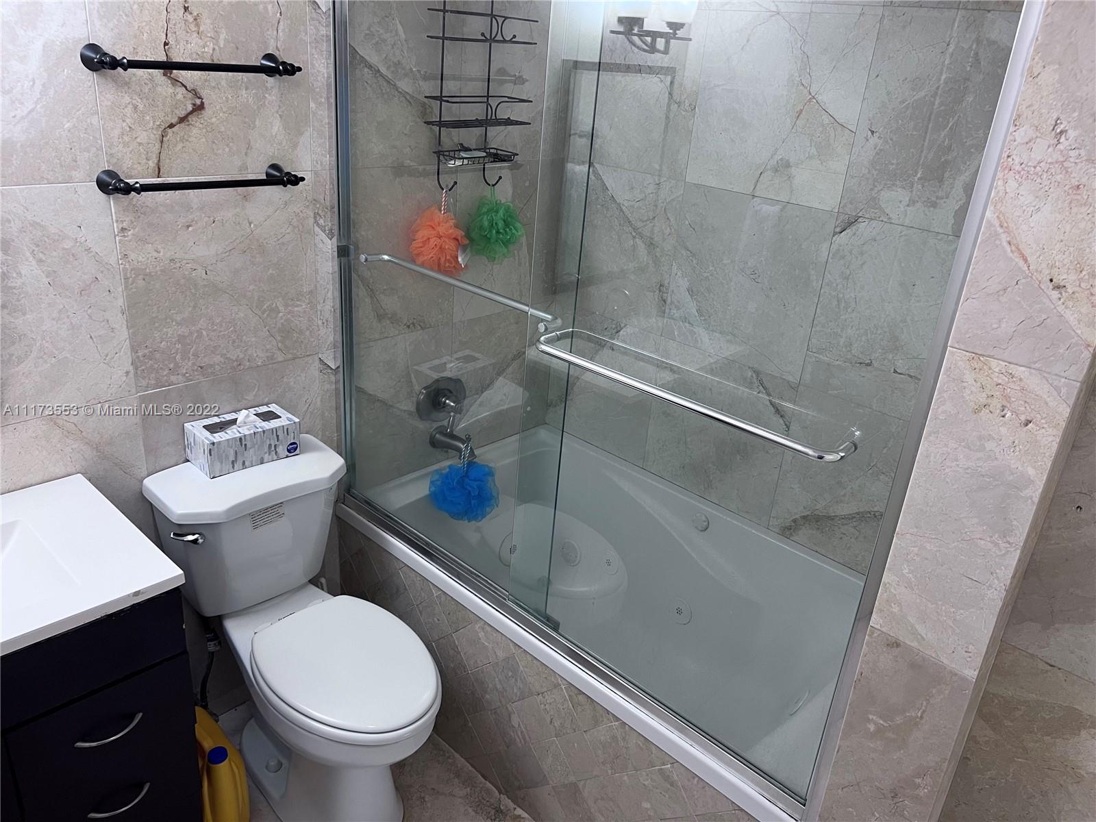 2075 Southwest 122nd Avenue, Unit 320 Miami, FL 33175 - Photo 24 of 38 a bathroom with a sink and toilet