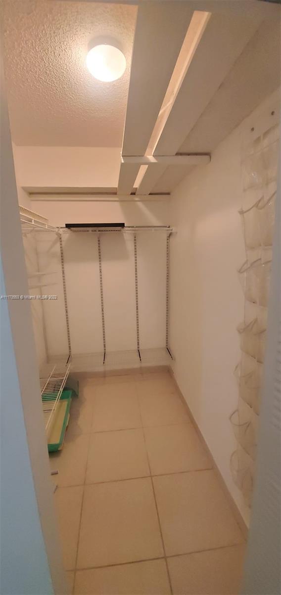 2075 Southwest 122nd Avenue, Unit 320 Miami, FL 33175 - Photo 27 of 38 a view of a room with an empty space