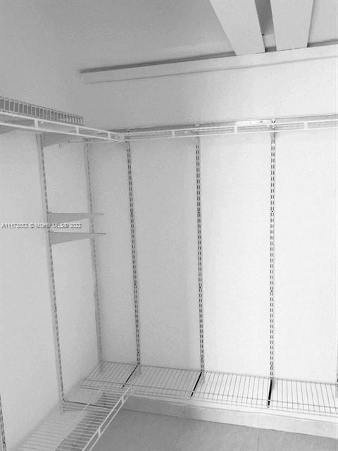 2075 Southwest 122nd Avenue, Unit 320 Miami, FL 33175 - Photo 28 of 38 a view of a room with racks on the wall