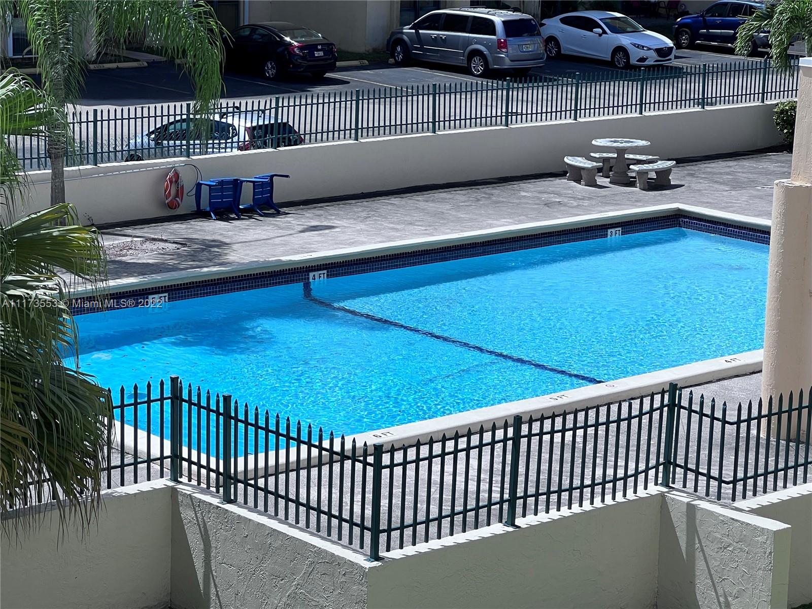 2075 Southwest 122nd Avenue, Unit 320 Miami, FL 33175 - Photo 9 of 38 a view of a roof deck with couches