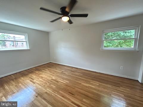 328 Hoffnagle Street, Unit 2 Philadelphia, PA 19111 - Photo 20 of 39 wooden floor in an empty room with a window