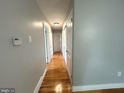 328 Hoffnagle Street, Unit 2 Philadelphia, PA 19111 - Photo 30 of 39 a view of a hallway with wooden floor