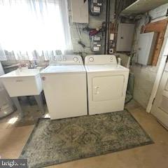 328 Hoffnagle Street, Unit 2 Philadelphia, PA 19111 - Photo 36 of 39 a utility room with dryer and washer