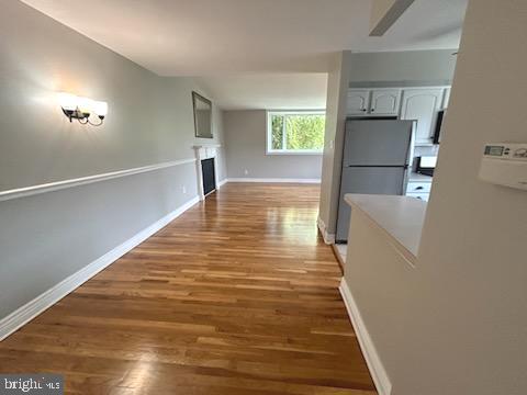328 Hoffnagle Street, Unit 2 Philadelphia, PA 19111 - Photo 8 of 39 a view of a living room with furniture and a fireplace