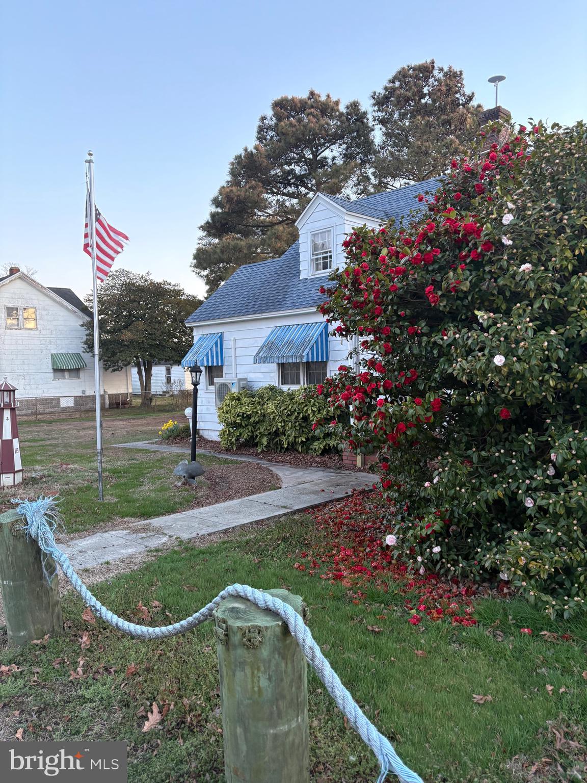a view of a house with a garden