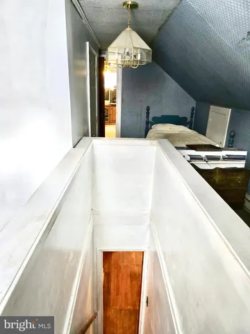 a view of kitchen with wooden floor