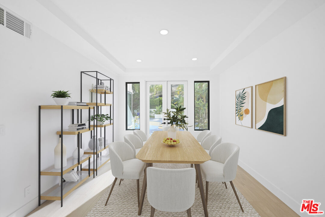 5566 Spring Hill Court Westlake Village, CA 91362 - Photo 12 of 66 a view of a dining room with furniture a rug and wooden floor