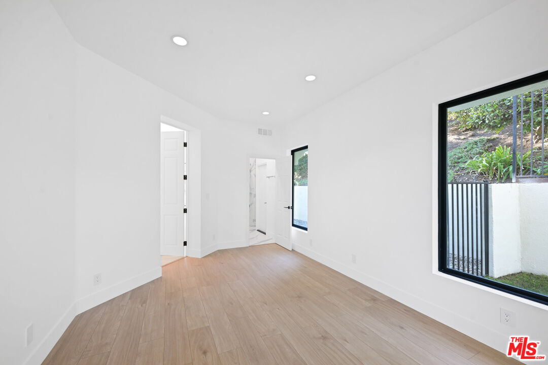 5566 Spring Hill Court Westlake Village, CA 91362 - Photo 15 of 66 an empty room with windows
