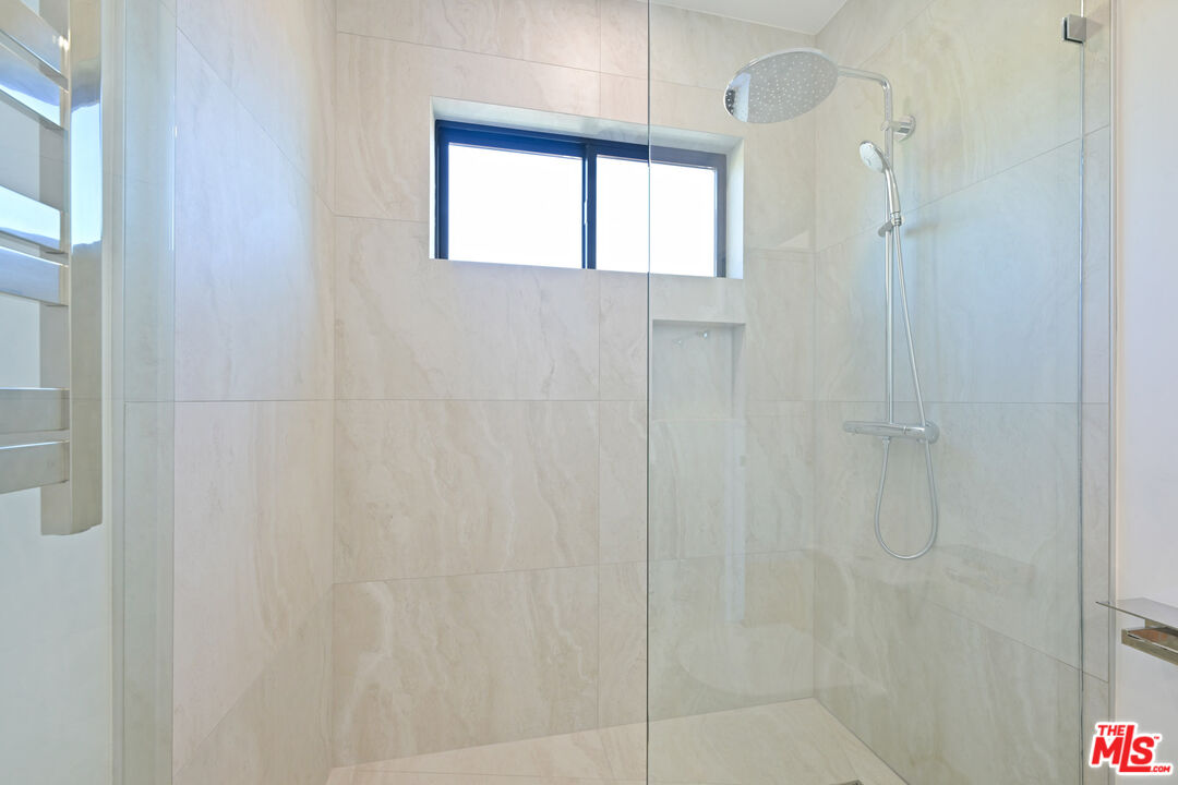 5566 Spring Hill Court Westlake Village, CA 91362 - Photo 40 of 66 a bathroom with a shower