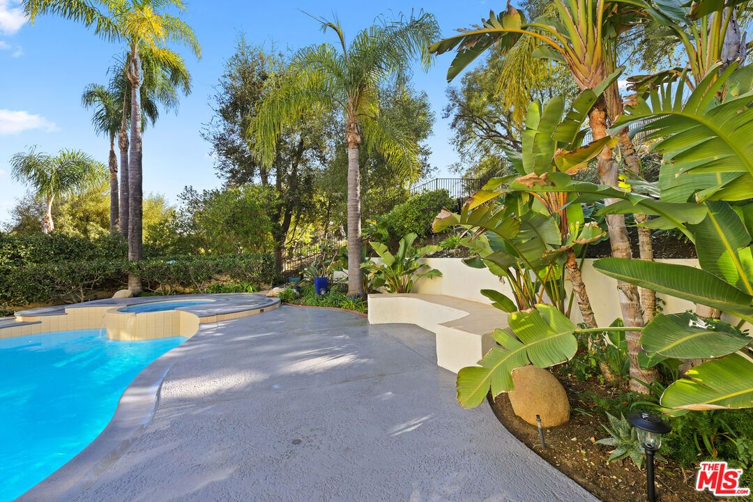 5566 Spring Hill Court Westlake Village, CA 91362 - Photo 60 of 66 a view of a yard with a plant
