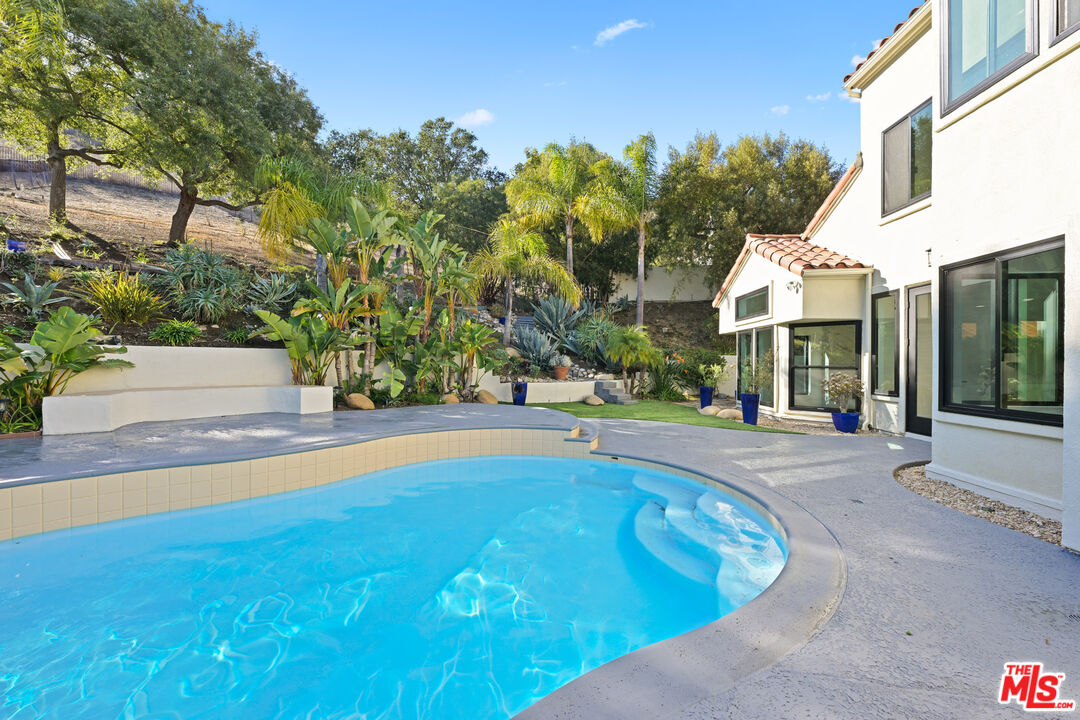 5566 Spring Hill Court Westlake Village, CA 91362 - Photo 63 of 66 a view of outdoor space yard and swimming pool