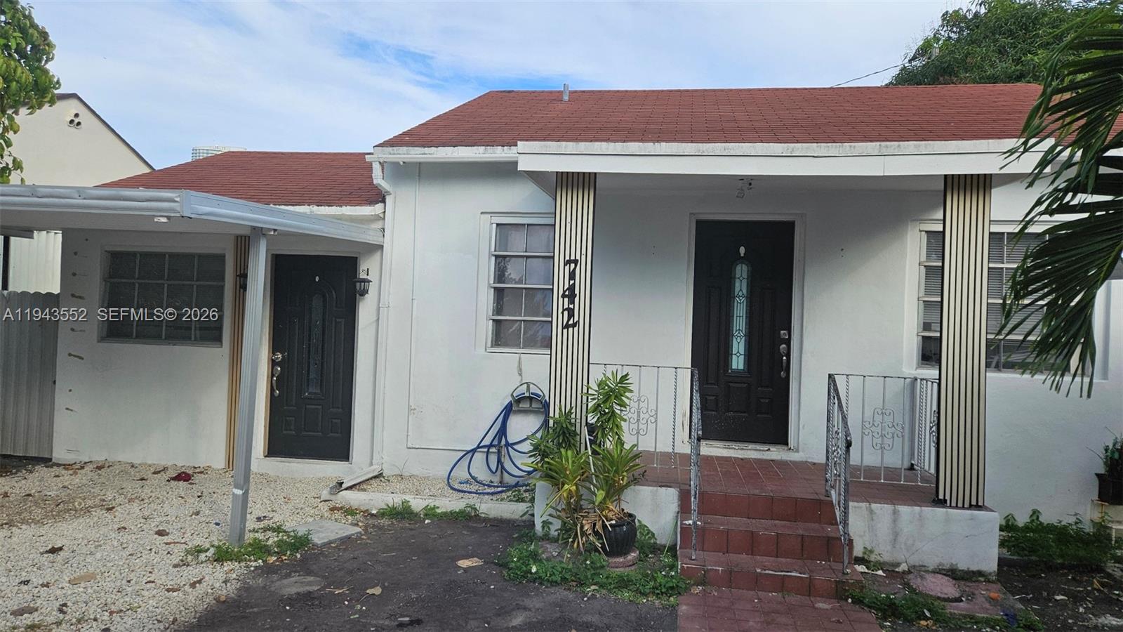 742 Southwest 10th Street Miami, FL 33130 - Photo 2 of 9 a front view of a house