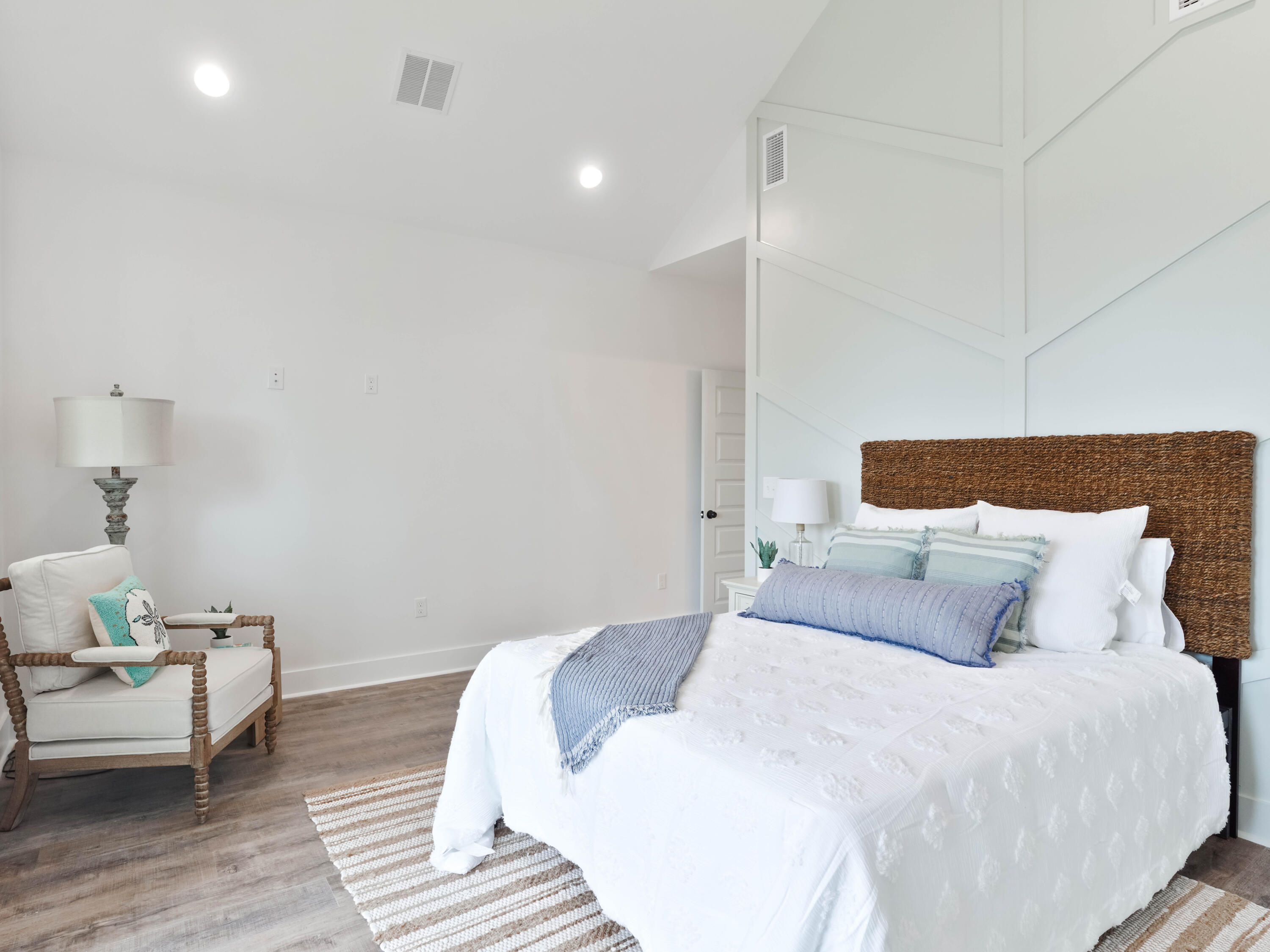 112 North Wall St Inlet Beach Inlet Beach, FL 32461 - Photo 23 of 26 a bedroom with a bed and wooden floor