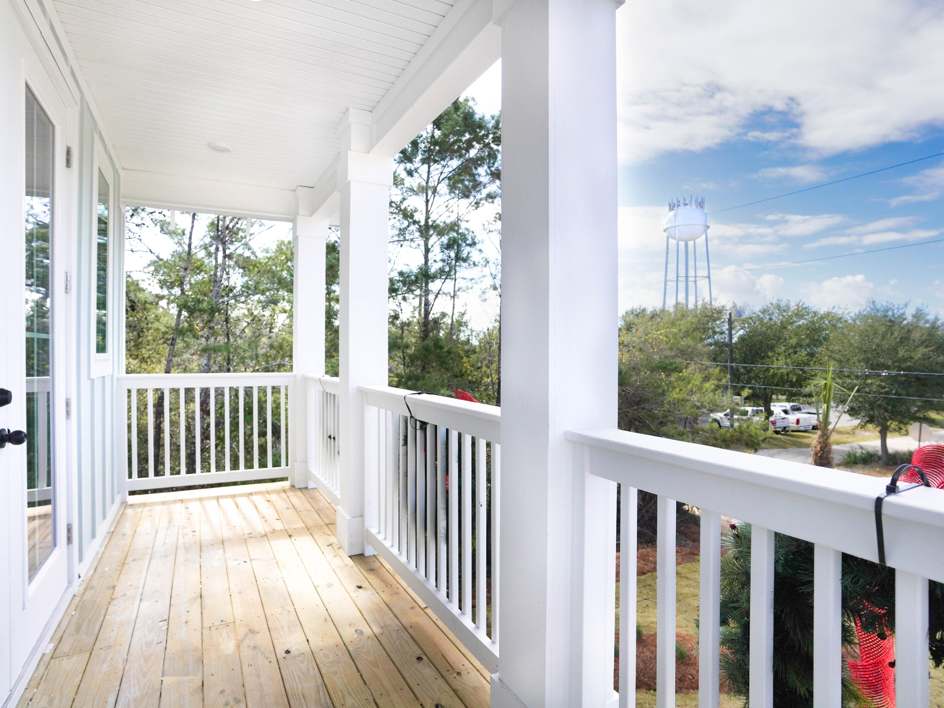 112 North Wall St Inlet Beach Inlet Beach, FL 32461 - Photo 26 of 26 a view of a balcony with wooden floor