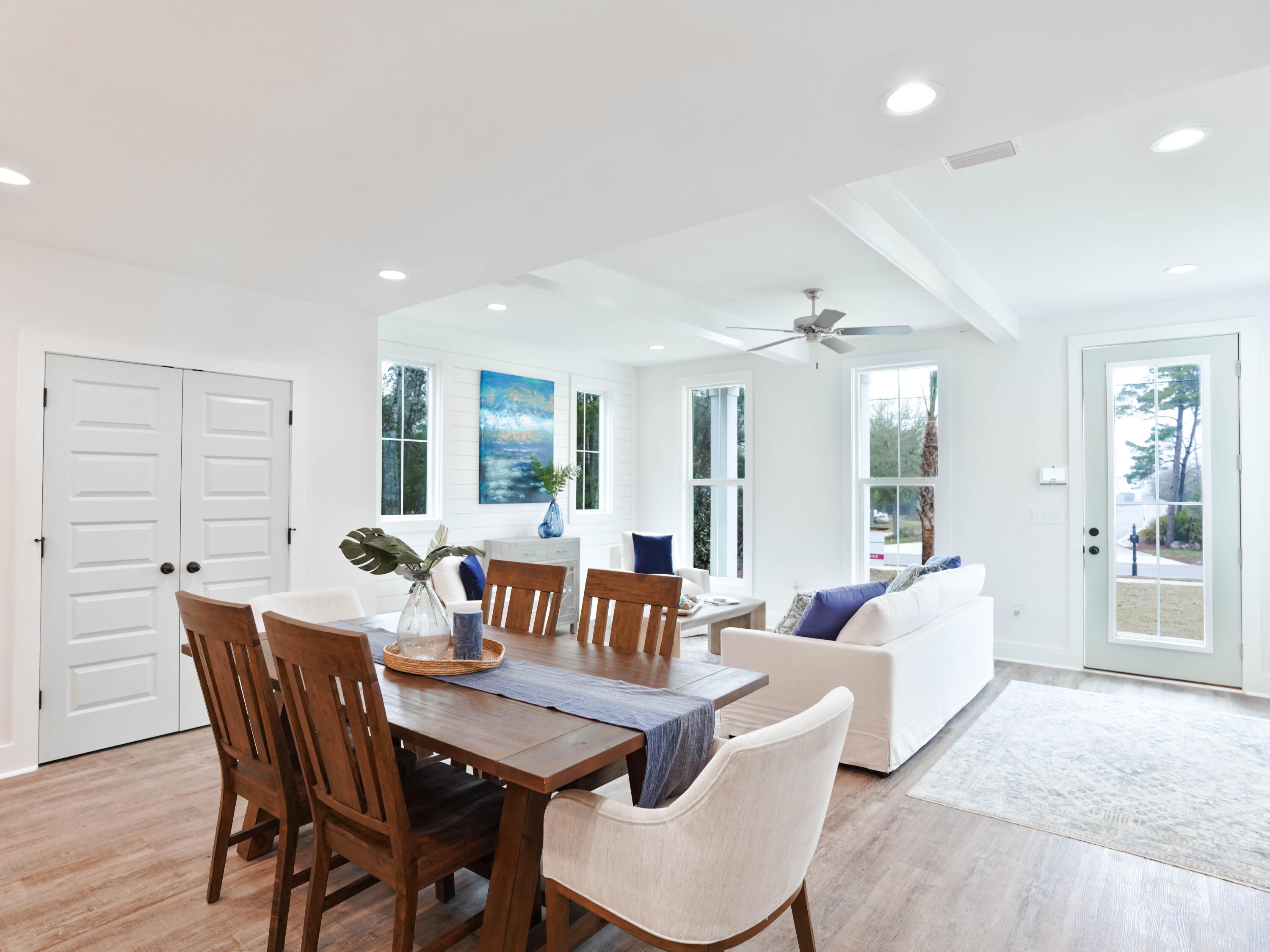 112 North Wall St Inlet Beach Inlet Beach, FL 32461 - Photo 8 of 26 a view of a dining room with furniture window and wooden floor