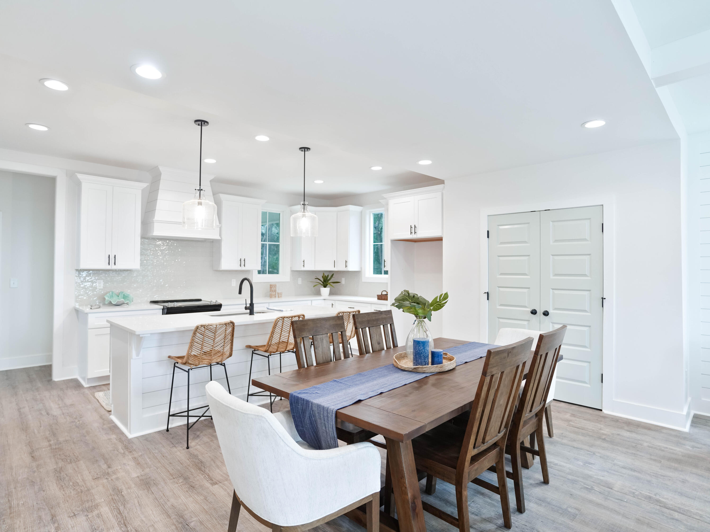 112 North Wall St Inlet Beach Inlet Beach, FL 32461 - Photo 9 of 26 a large kitchen with a table and chairs