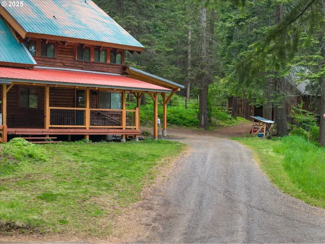 a view of a house with a yard balcony and garden