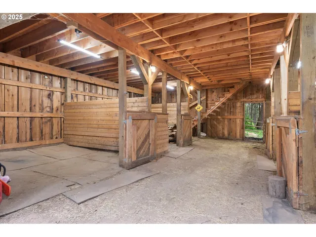 a view of an empty room with a wooden roof