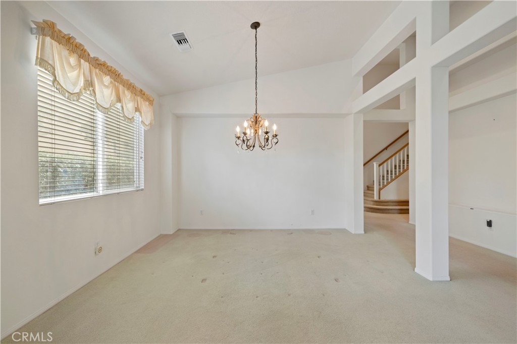 25018 Smokewood Way Stevenson Ranch, CA 91381 - Photo 14 of 71 a view of an empty room with a window