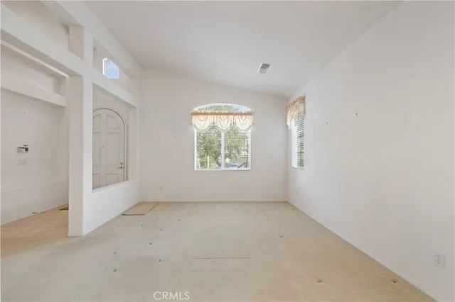 an empty room with a window