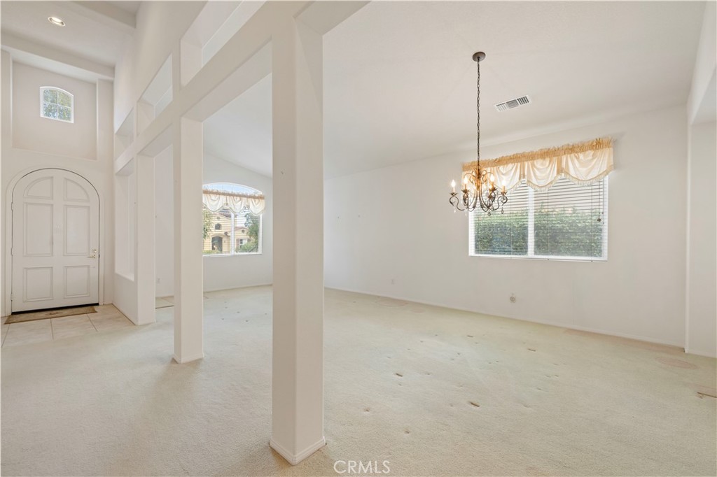 25018 Smokewood Way Stevenson Ranch, CA 91381 - Photo 17 of 71 a view of an empty room with a window