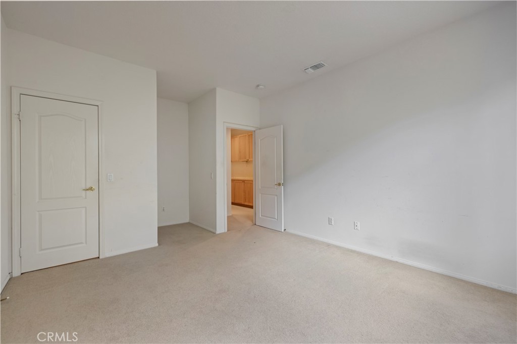 25018 Smokewood Way Stevenson Ranch, CA 91381 - Photo 22 of 71 a view of an empty room