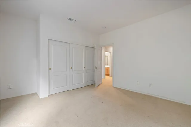 a kitchen with a sink a refrigerator and window