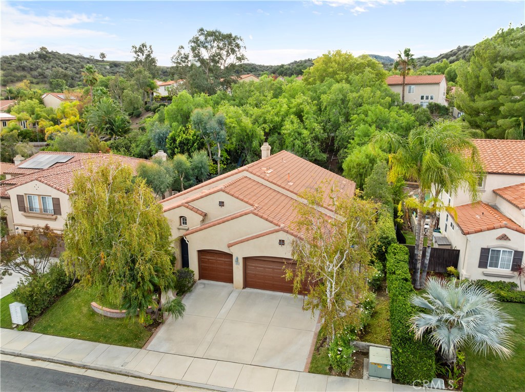 25018 Smokewood Way Stevenson Ranch, CA 91381 - Photo 3 of 71 an aerial view of a house