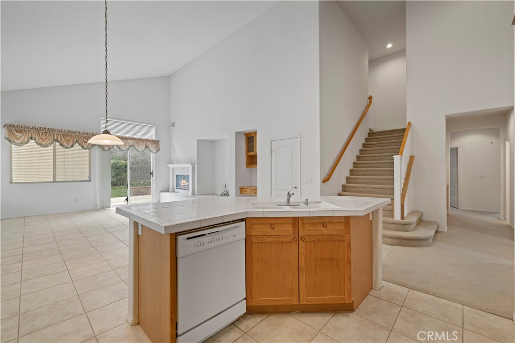 25018 Smokewood Way Stevenson Ranch, CA 91381 - Photo 40 of 71 a kitchen with a sink and cabinets