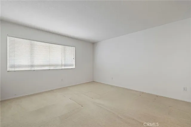 a view of a mountain range with a lush green hillside