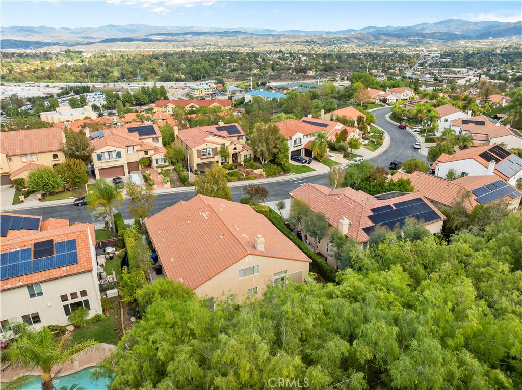 25018 Smokewood Way Stevenson Ranch, CA 91381 - Photo 61 of 71 an aerial view of residential houses with outdoor space