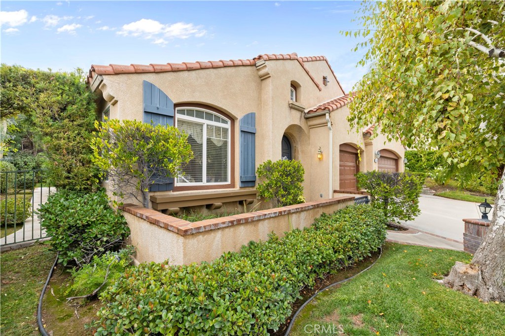 25018 Smokewood Way Stevenson Ranch, CA 91381 - Photo 69 of 71 a aerial view of a house with a yard