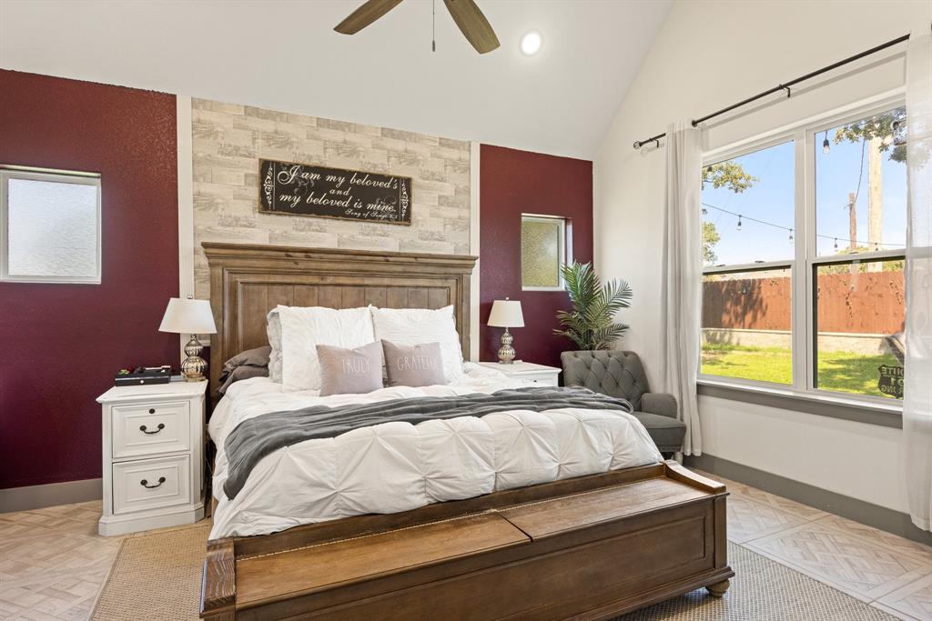 2000 Rattler Way Tolar, TX 76476 - Photo 10 of 33 a bedroom with a bed and a large window